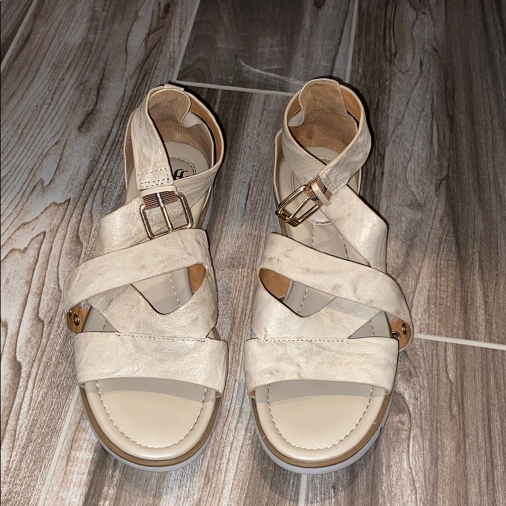 Tan/gold Soft straps sandal with small wedge.